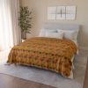 Mid Century Modern Autumn Leaves, Acorns and Mushrooms Sherpa Fleece Blanket on bed