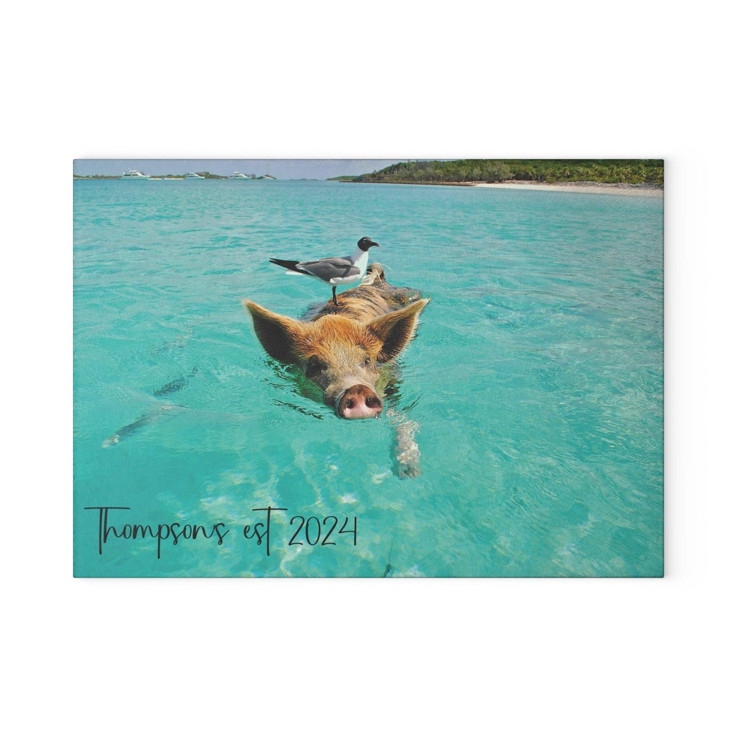 Pig and Bird Swimming in the Ocean Glass Cutting Board small