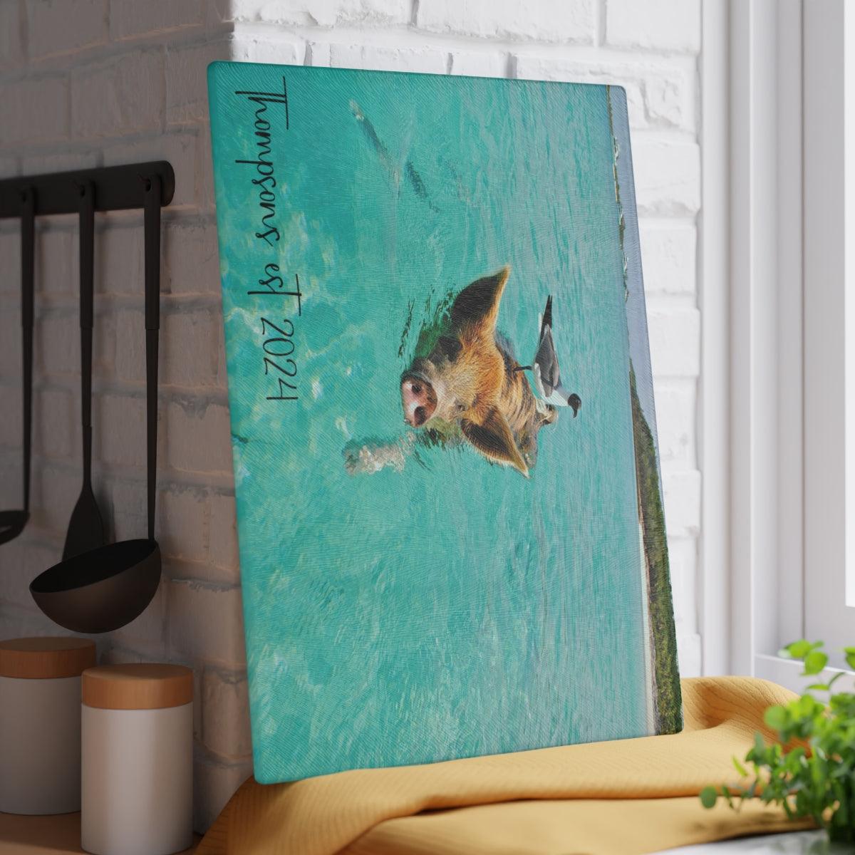 Pig and Bird Swimming in the Ocean Glass Cutting Board vertical against wall