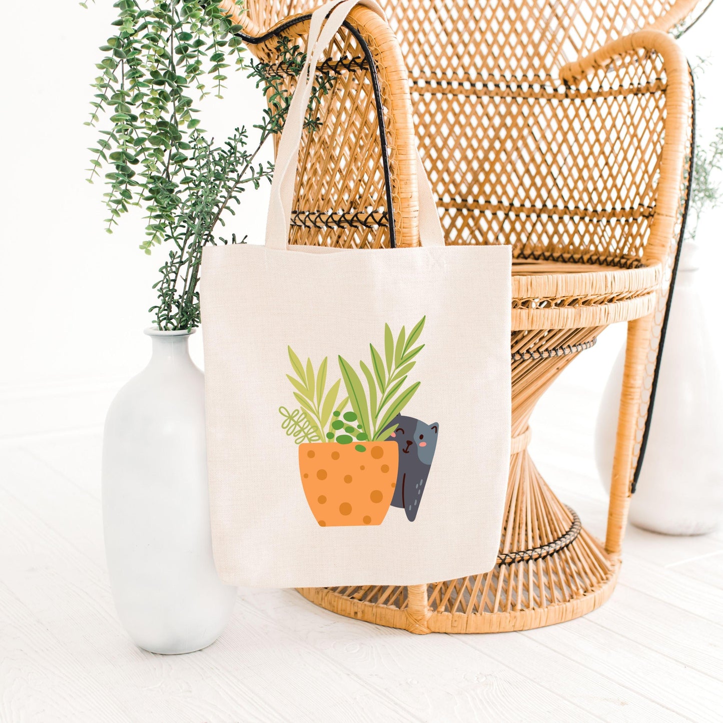 Plant with Cat Peaking from Behind Canvas Tote Bag on chair