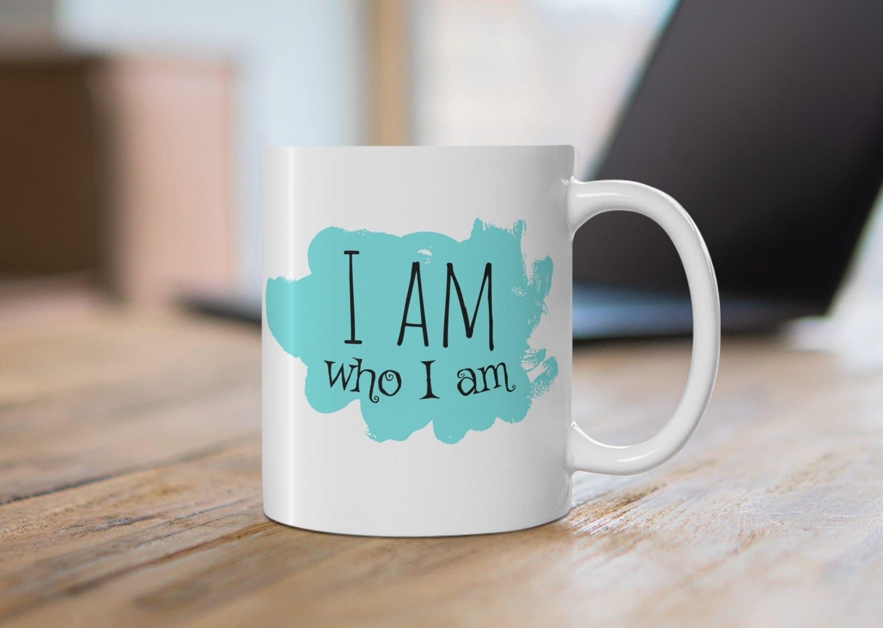 I Am Who I Am Christian Coffee Mug on table