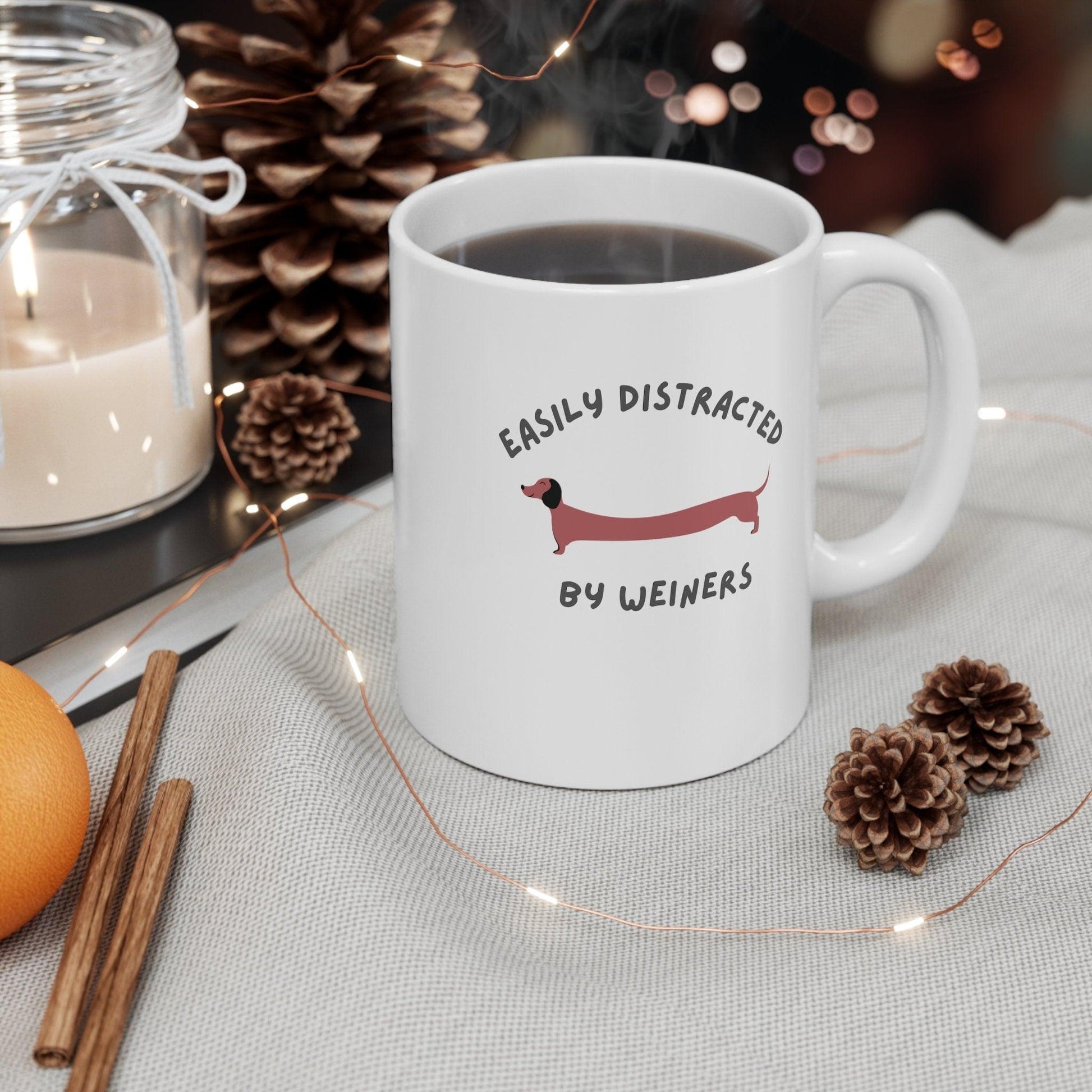 Easily Distracted by Weiners Dog Coffee Mug on table