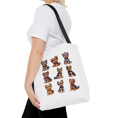 Yorkie Pups Canvas Tote Bag on a persons shoulder