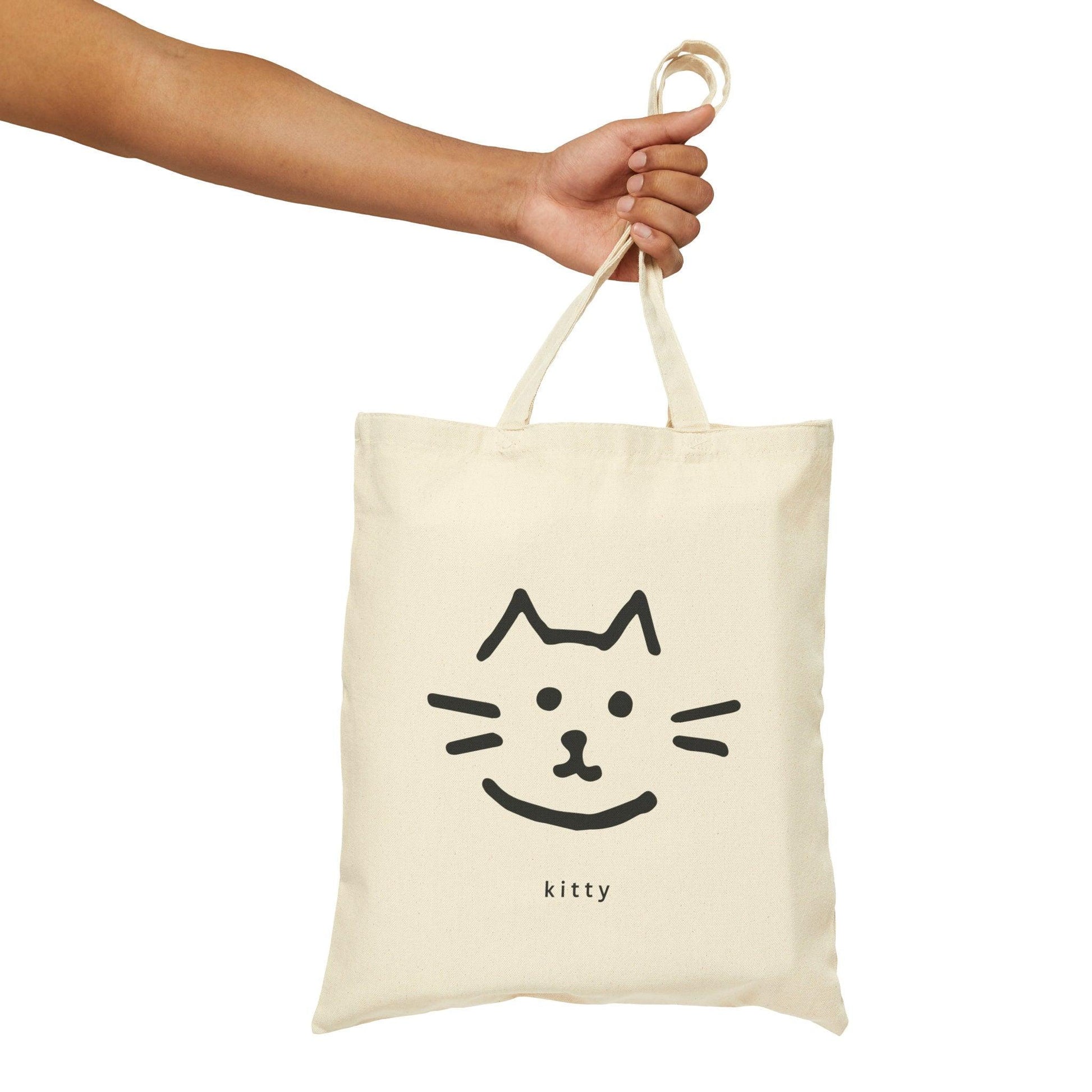 Kitty Cat Canvas Tote Bag holding bag