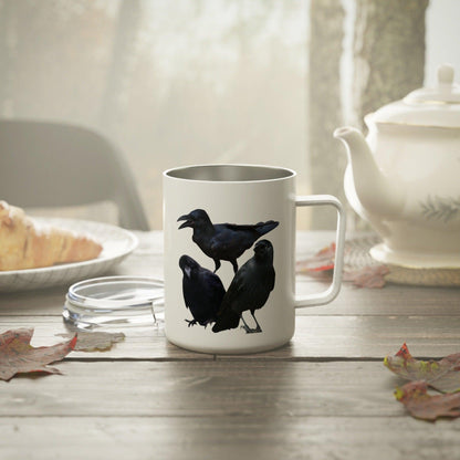 Crows Insulated Coffee Mug on table