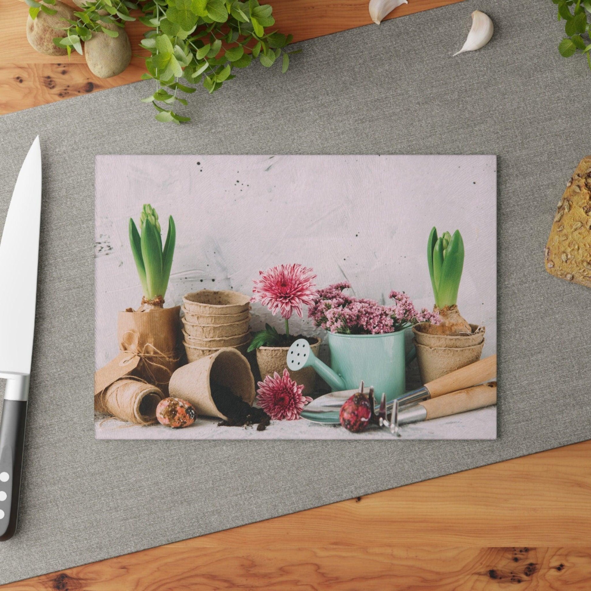 Garden Pots and Plants Glass Cutting Board on table