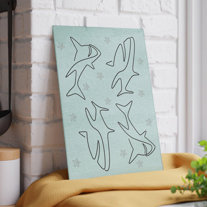 Shark and Starfish Line Art Glass Cutting Board against wall vertical