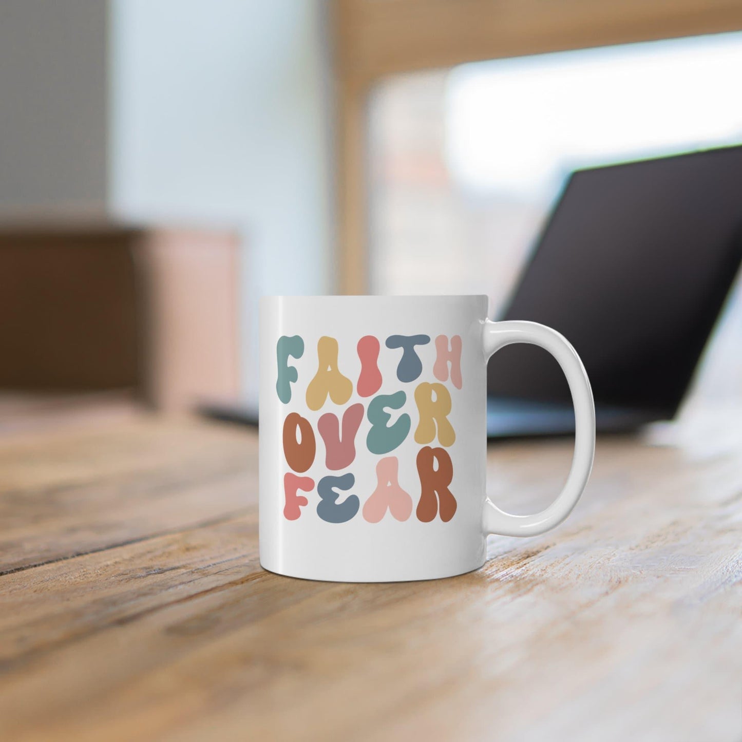 Faith Over Fear Retro Coffee Mug on table