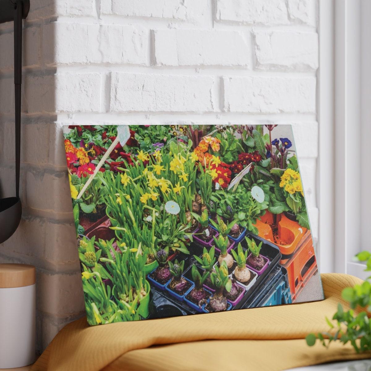 Flowers Blubs and Pots Garden Glass Cutting Board against wall