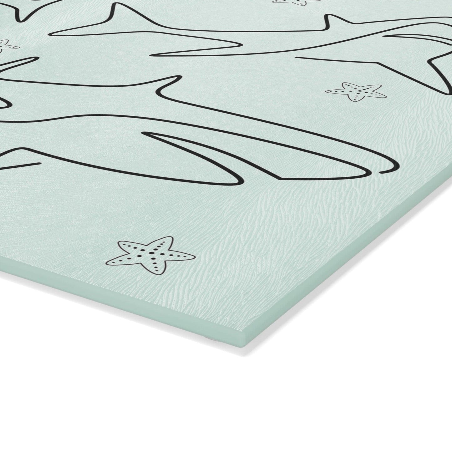 Shark and Starfish Line Art Glass Cutting Board corner shot