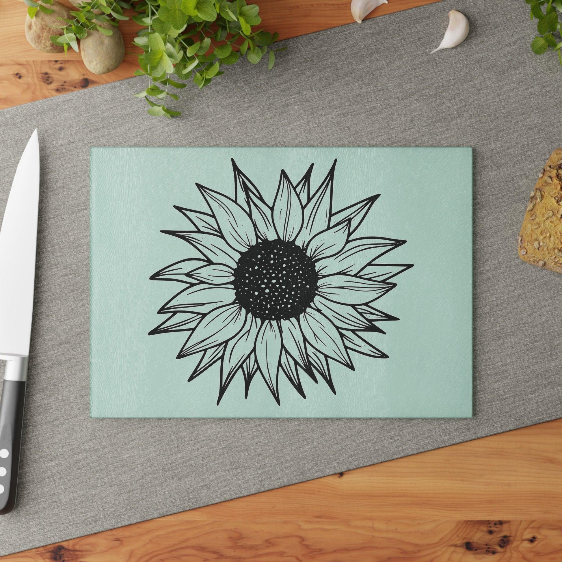 Sunflower Glass Cutting Board on table